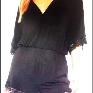 Black crossover eyelet lace trim finish romper